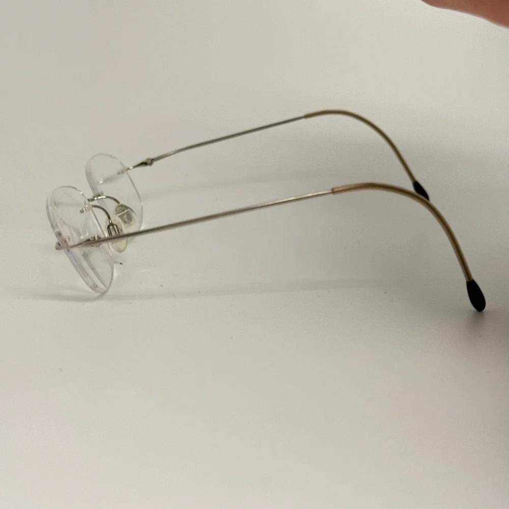 Charmant CH8600 Silver Beta Titanium Rimless Eyeglass Frames 49-19-140mm
